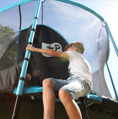 Children playing on trampoline